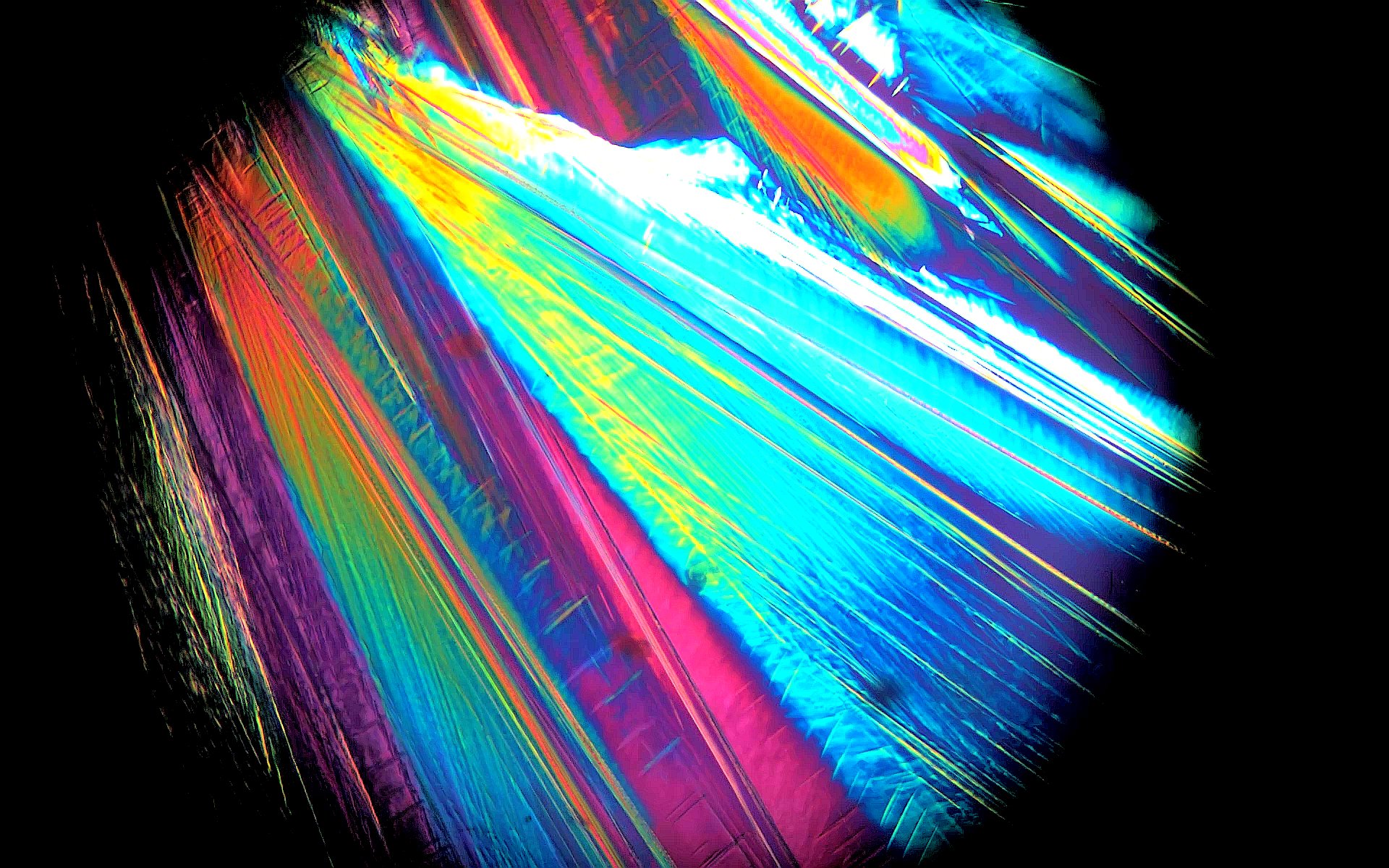 color-enhanced polarized light microscopy frame of the zinc chloride trihydrate freezing