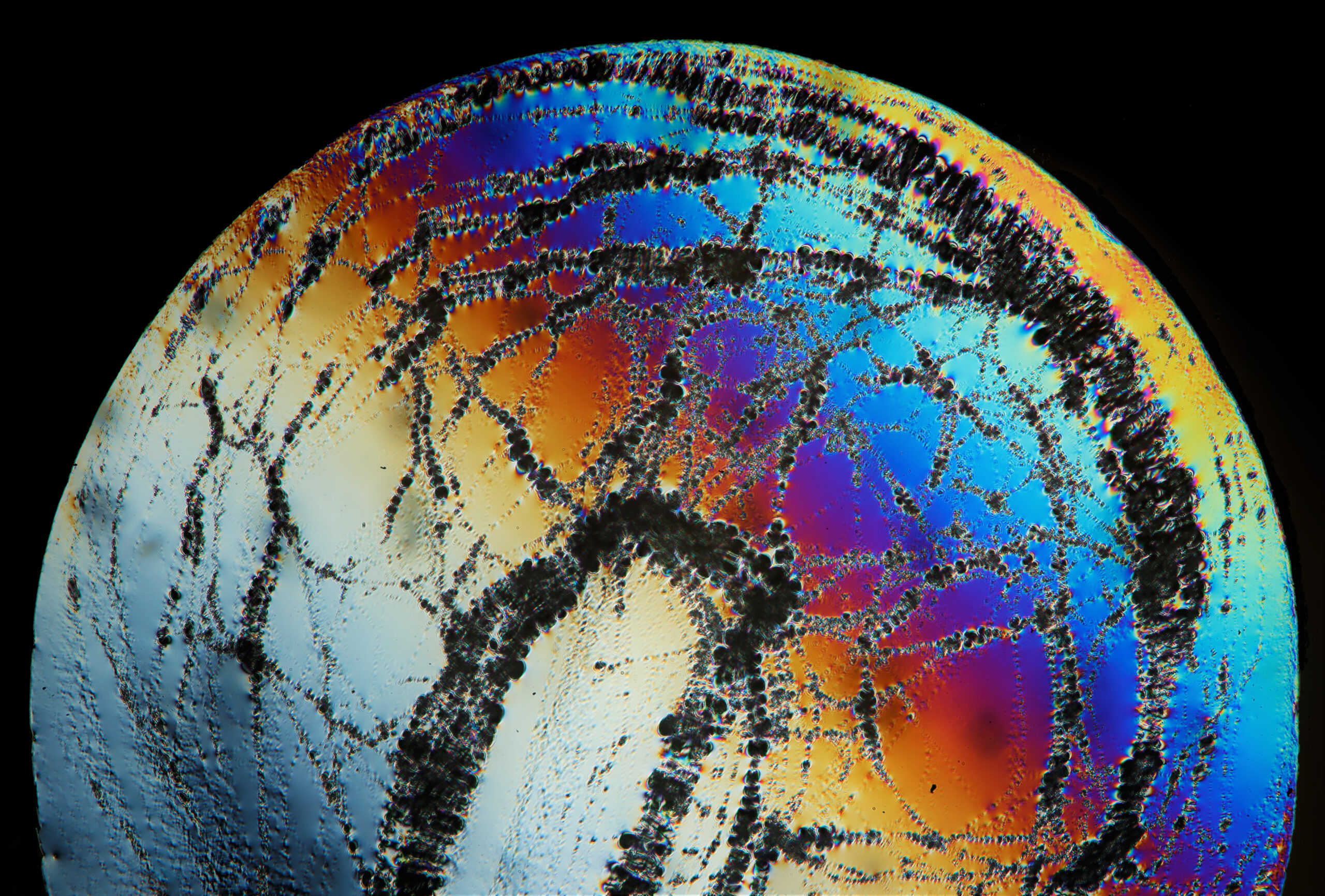 regions of a liquid metal droplet that have collapsed under vacuum