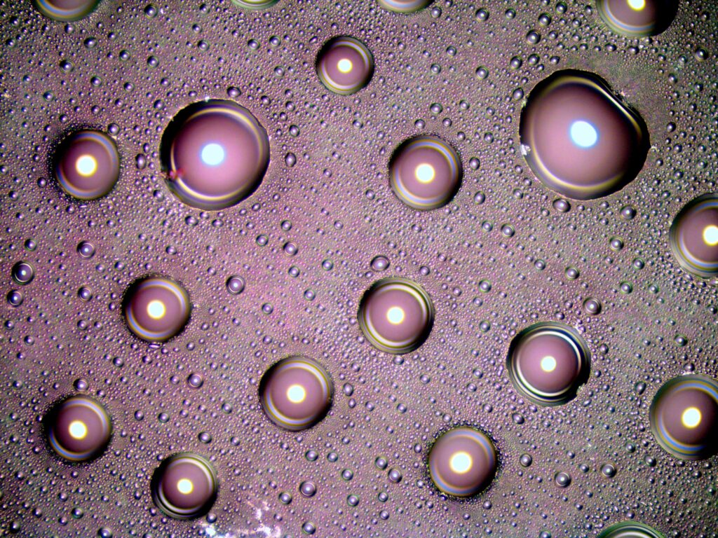 magnified surface of a room temperature cured epoxy with bubbles