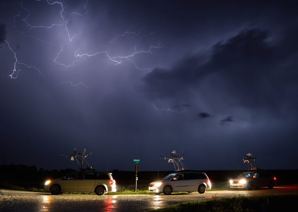 vans collecting data of passing storms